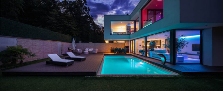 a poolside cabana/guest house with LED lighting
