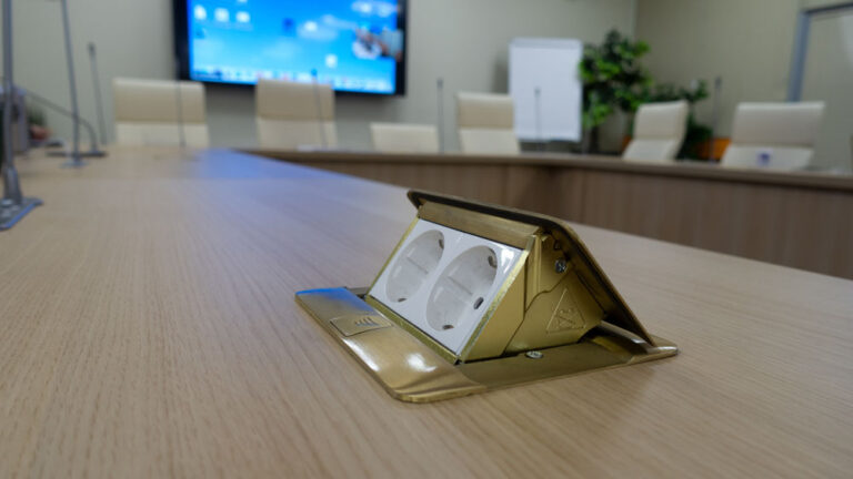 recessed outlets on a conference room table