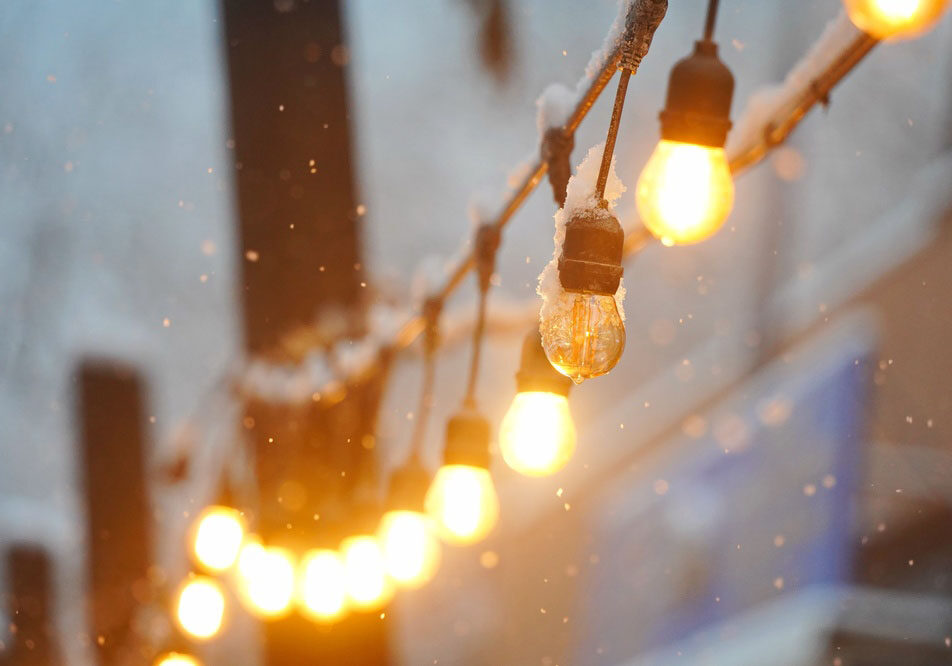 A row of lights with several bulbs burned out