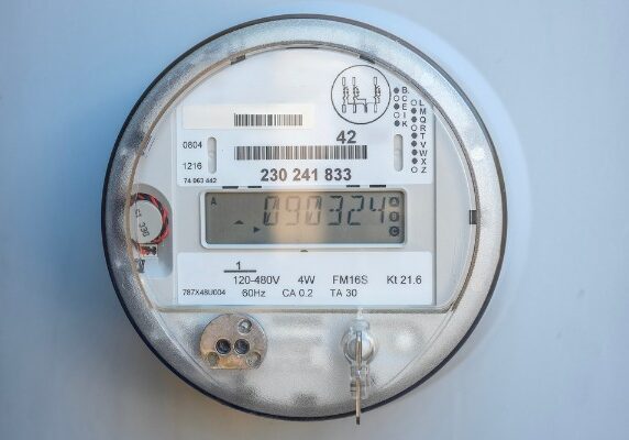 digital electric meter on exterior wall