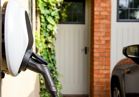 electric vehicle charger mounted on home wall