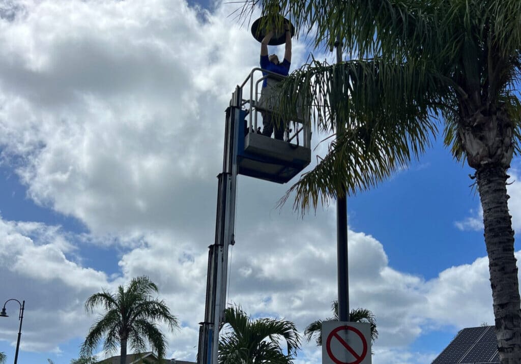 Electrician Repairing Lights